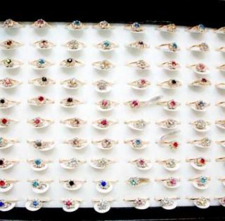 LOT 100 BAGUES FANTAISIE BGF16