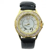Montre dorée parée de strass