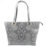 Sac à main avec volutes brodées et longues sangles