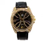 Montre bracelet fantaisie pour femme sertie de strass