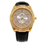 Montre-bracelet dorée pour femme agrémentée de strass
