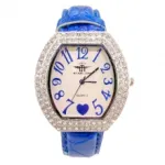 Montre pour femme à cadran ovale orné de strass et bracelet classique