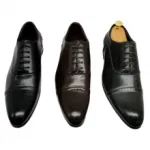 Chaussures de ville avec bout allongé et perforation