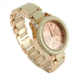 Montre bijou dorée avec trois compteurs