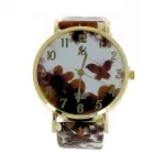 Montre-bracelet dorée imprimée fleuri