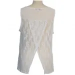 Top avec poche zippée et dentelle au dos