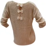 Pull en maille orné de nœuds à boucle dorée au dos