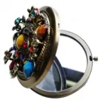 Miroir de sac fantaisie style ancien avec strass et métal travaillé