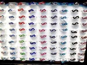 LOT 100 BAGUES FANTAISIE BGF15