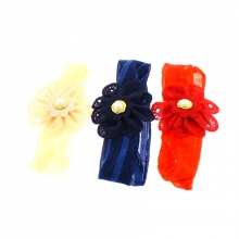 Bandeau orné d’une fleur perforée à perle