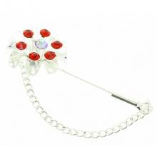 Broche fleur à strass avec une chaînette argentée