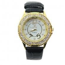 Montre dorée parée de strass