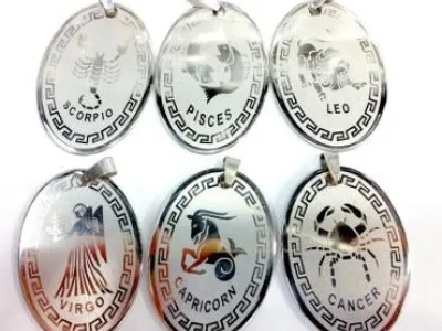 LOT 50 PENDENTIFS ACIER ZODIAC