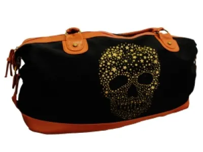 Sac à main imprimé tête de mort clouté