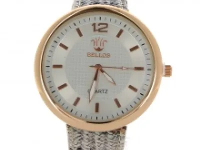 Montre-bracelet dorée avec bracelet tressé