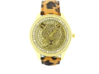 Montre-bracelet avec motif léopard doré
