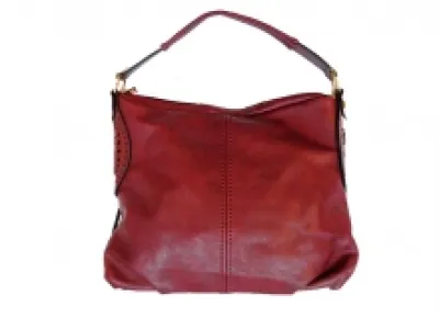 Sac à main très chic avc motif perforé côté