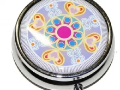Boîte à médicaments ronde avec motif fantaisie