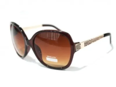 Jolies lunettes de soleil femme avec branches en métal